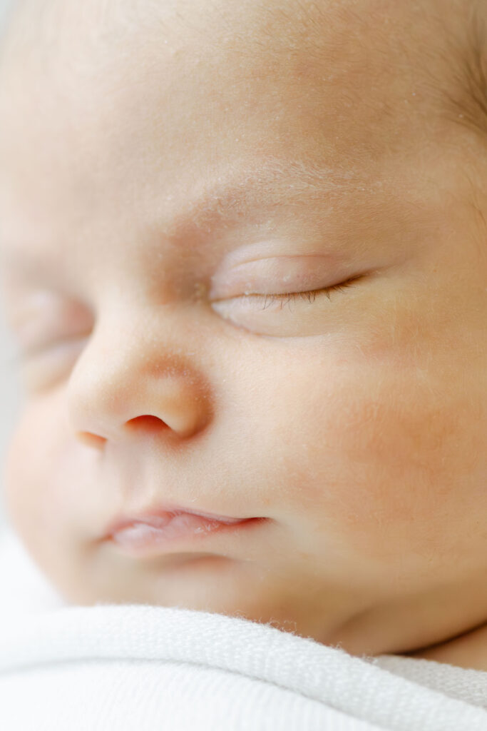 Roswell Newborn Photographer close up of baby's face.