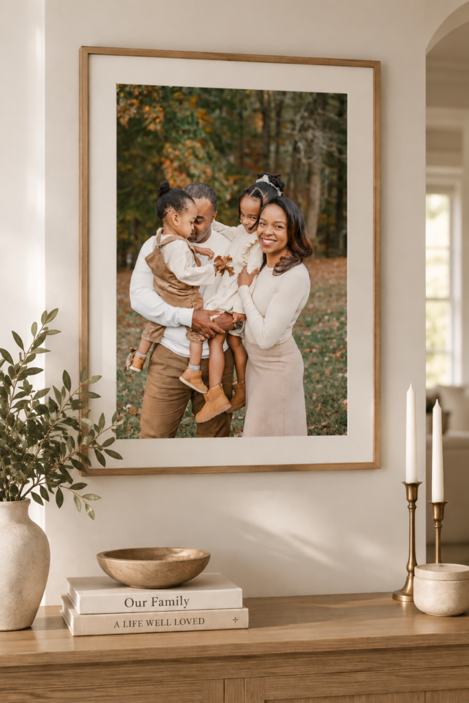 Family photo on wall in custom frame from megan wilson photography